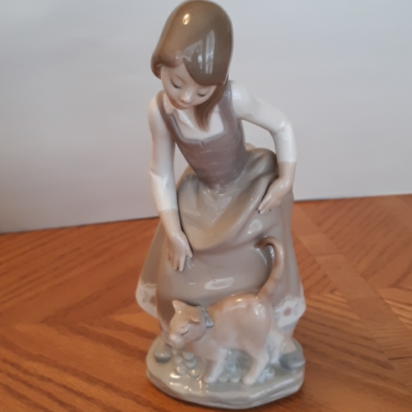 Lladro girl with cat. Made in Spain